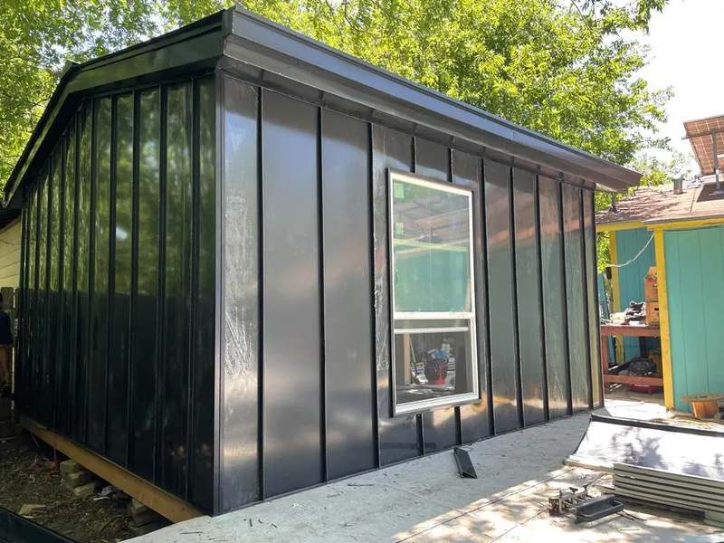 Black standing seam metal wall panels for Metal Roof Installation in Brook Park