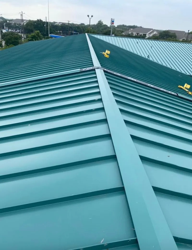 Green commercial metal roof ridge and valley for Metal Roof Repair in Brook Park